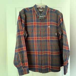 NWT.  Eddie Bauer flannel shirt. Multi colored. Navy, hunter green, red.